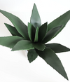 Close-up of artificial green leaf texture - High-quality faux greenery background